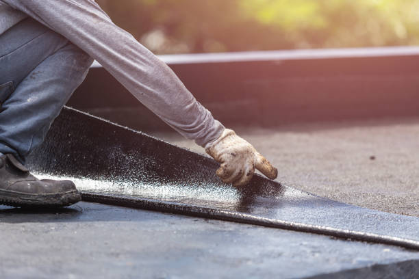 Professional Waterproofing technician working in Boston, NY